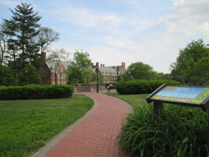 A brick pathway and seating area